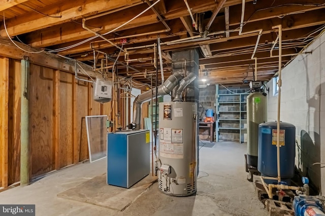 unfinished basement featuring water heater, a water pressure tank, and a heating unit