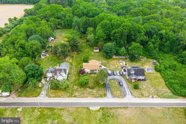 drone / aerial view of a heavily wooded area