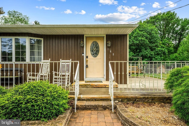 property entrance with fence