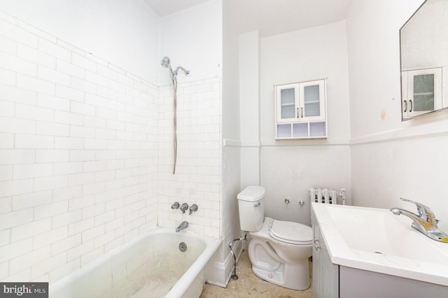 bathroom featuring toilet, washtub / shower combination, vanity, and radiator