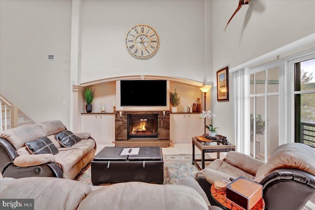 320 Hummingbird Way Unit 302, Lake Harmony, PA 18624 - living area featuring a towering ceiling and a fireplace