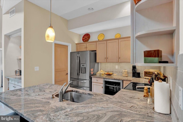 320 Hummingbird Way Unit 302, Lake Harmony, PA 18624 - kitchen with a sink, wine cooler, stainless steel fridge, open shelves, and light stone countertops