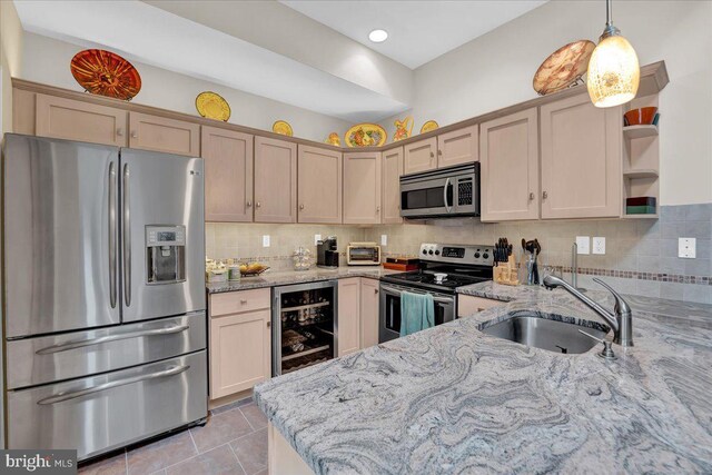 320 Hummingbird Way Unit 302, Lake Harmony, PA 18624 - kitchen with appliances with stainless steel finishes, wine cooler, a sink, open shelves, and light stone counters