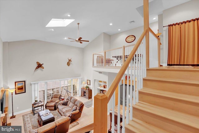 320 Hummingbird Way Unit 302, Lake Harmony, PA 18624 - living area with a skylight, high vaulted ceiling, baseboards, a ceiling fan, and recessed lighting