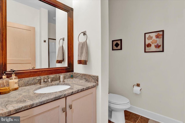 320 Hummingbird Way Unit 302, Lake Harmony, PA 18624 - bathroom with tile patterned flooring, vanity, baseboards, and toilet