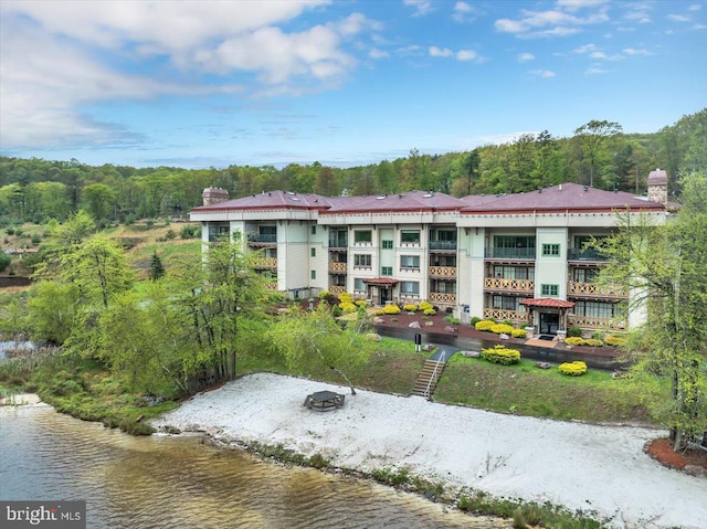 320 Hummingbird Way Unit 302, Lake Harmony, PA 18624 - back of house featuring a chimney and a water view