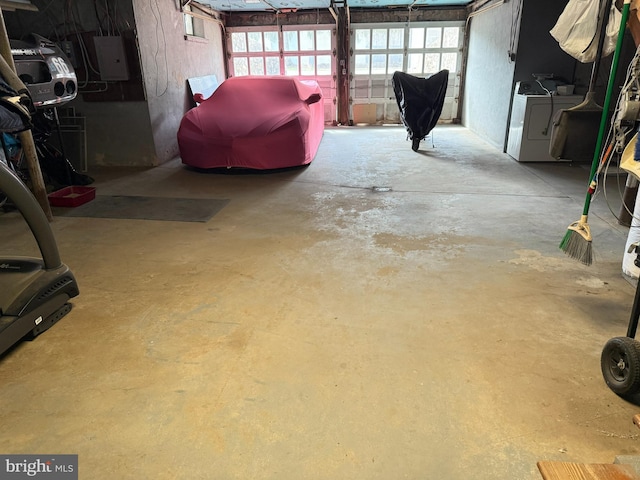 basement with washing machine and clothes dryer