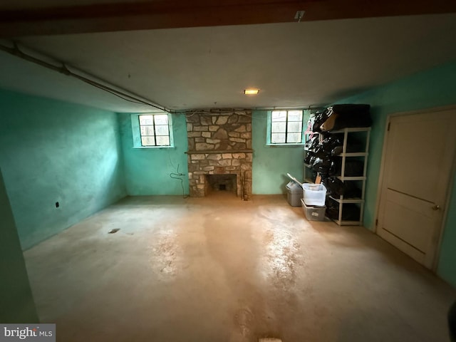 basement with a fireplace