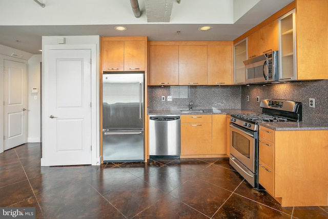 916 G St NW Unit 505, Washington, DC 20001 - kitchen with stainless steel appliances, backsplash, dark tile patterned flooring, recessed lighting, and glass insert cabinets