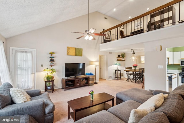 living area featuring light carpet, ceiling fan, high vaulted ceiling, baseboards, and recessed lighting