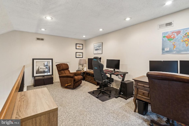 office area with carpet flooring, recessed lighting, a textured ceiling, and lofted ceiling