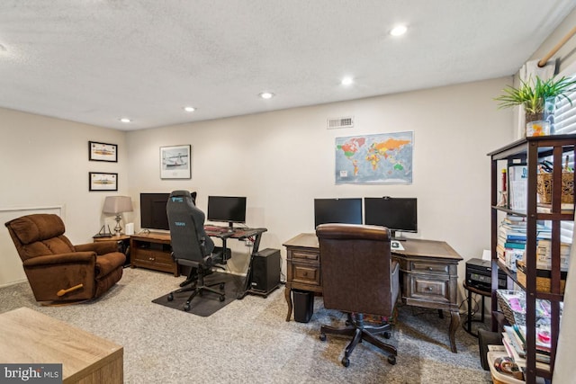 office with carpet and recessed lighting