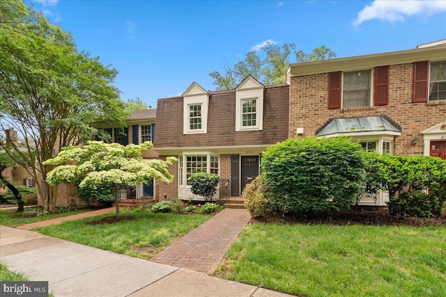 4516 4th Rd N, Arlington, VA 22203 - view of front of property with brick siding, a front yard, mansard roof, and a shingled roof