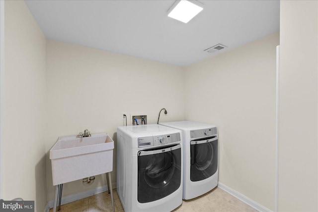 4516 4th Rd N, Arlington, VA 22203 - washroom featuring washing machine and dryer and baseboards