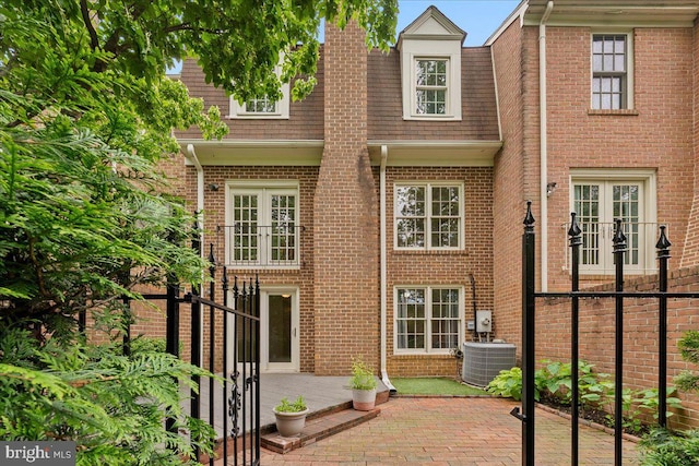 4516 4th Rd N, Arlington, VA 22203 - rear view of property with a patio area, central AC, and brick siding