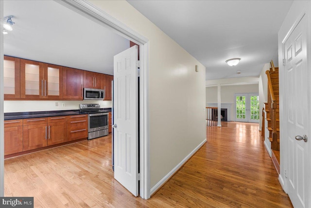 4516 4th Rd N, Arlington, VA 22203 - hallway with light wood-style floors, french doors, and baseboards