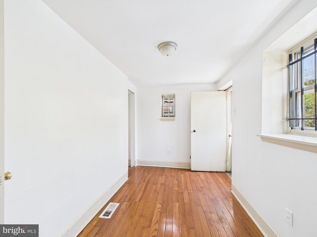 4712 Woodland Ave, Philadelphia, PA 19143 - corridor featuring baseboards and light wood finished floors