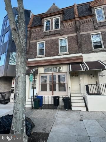 4712 Woodland Ave, Philadelphia, PA 19143 - multi unit property featuring cooling unit and brick siding