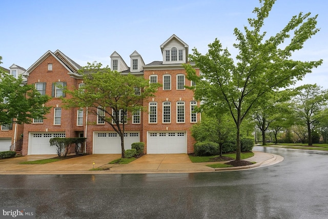 2714 Cabernet Ln, Annapolis, MD 21401 - view of front facade with brick siding, an attached garage, and driveway