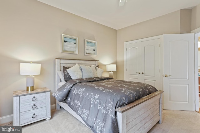 2714 Cabernet Ln, Annapolis, MD 21401 - bedroom featuring light carpet, a closet, and baseboards
