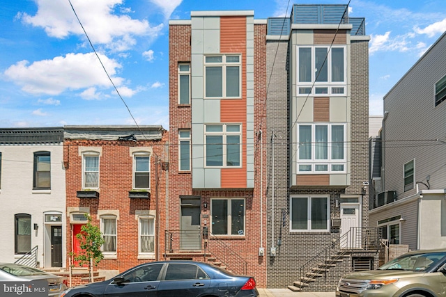 multi unit property featuring brick siding