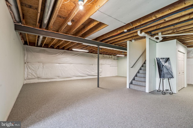 1723 Magnolia Ct, Garnet Valley, PA 19060 - below grade area featuring stairway and carpet flooring