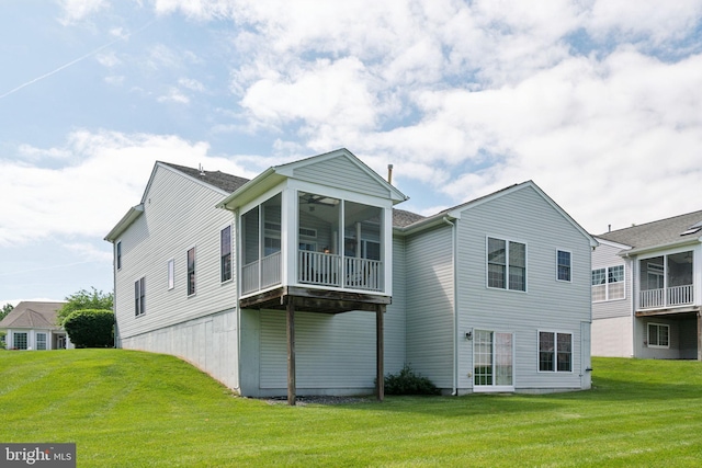 1723 Magnolia Ct, Garnet Valley, PA 19060 - rear view of house with a yard, ceiling fan, and a balcony