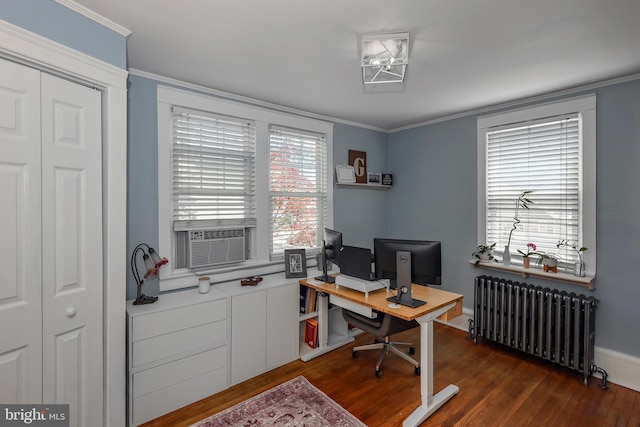 office area with radiator, dark wood-style floors, cooling unit, baseboards, and crown molding