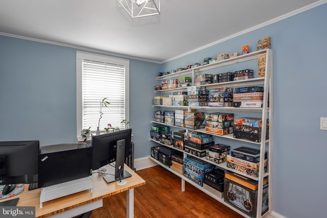office space with crown molding, wood finished floors, and baseboards