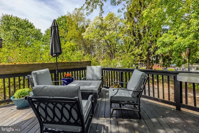 deck featuring an outdoor living space