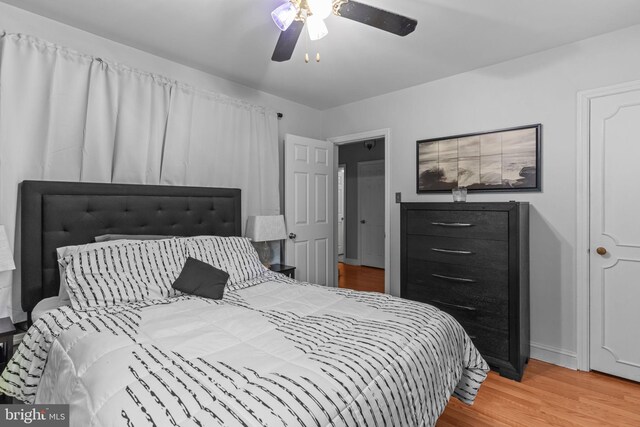 217 Lake Ave, Hamilton, NJ 08610 - bedroom with wood finished floors, baseboards, and a ceiling fan