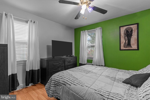217 Lake Ave, Hamilton, NJ 08610 - bedroom with wood finished floors and a ceiling fan