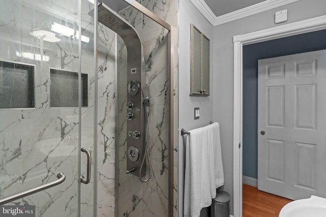 217 Lake Ave, Hamilton, NJ 08610 - bathroom with ornamental molding, a marble finish shower, and wood finished floors