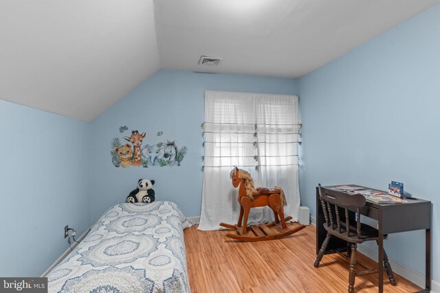 217 Lake Ave, Hamilton, NJ 08610 - bedroom with vaulted ceiling, wood finished floors, and baseboards