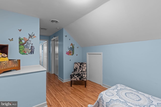 217 Lake Ave, Hamilton, NJ 08610 - bedroom with light wood-type flooring, baseboards, and vaulted ceiling