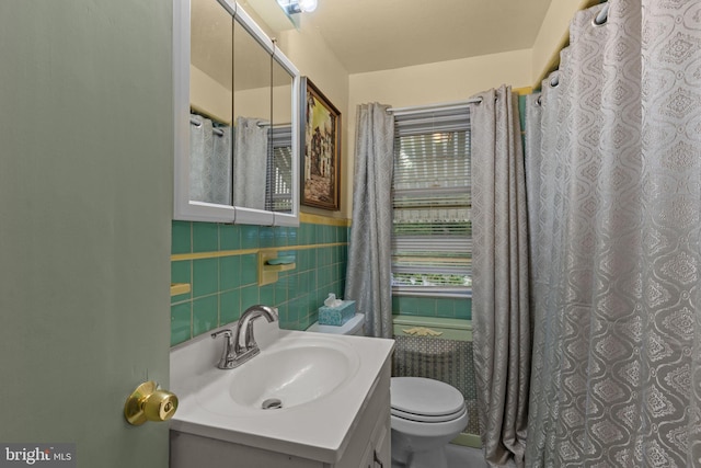 217 Lake Ave, Hamilton, NJ 08610 - full bath featuring toilet, vanity, and tile walls
