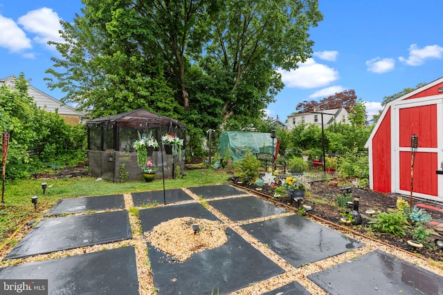 217 Lake Ave, Hamilton, NJ 08610 - view of patio / terrace featuring a greenhouse and an outdoor structure