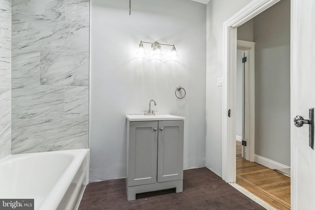 860 Foulkrod St, Philadelphia, PA 19124 - full bath with wood finished floors, a tub, and vanity