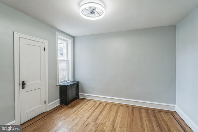 860 Foulkrod St, Philadelphia, PA 19124 - unfurnished room with wood finished floors and baseboards