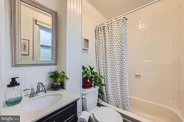 bathroom with shower / bath combo, vanity, and toilet