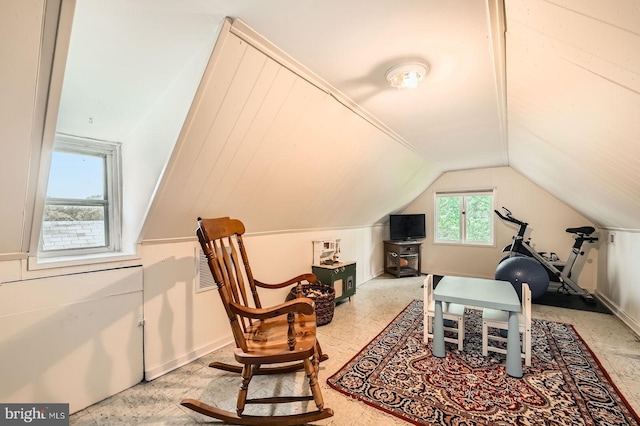 office area with vaulted ceiling