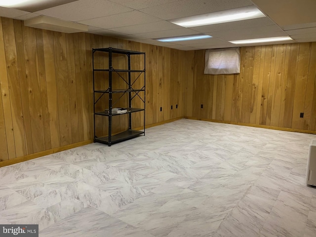 6219 Seminole Pl, Berwyn Heights, MD 20740 - finished below grade area with a drop ceiling, wooden walls, and baseboards
