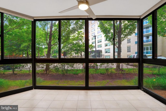1001 N Randolph St Unit 109, Arlington, VA 22201 - unfurnished sunroom with a ceiling fan and expansive windows