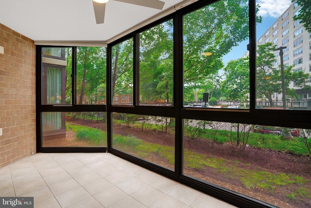 1001 N Randolph St Unit 109, Arlington, VA 22201 - unfurnished sunroom featuring ceiling fan and healthy amount of natural light