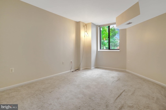 1001 N Randolph St Unit 109, Arlington, VA 22201 - unfurnished room featuring light colored carpet and baseboards