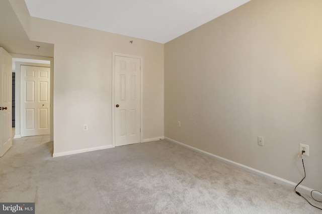 1001 N Randolph St Unit 109, Arlington, VA 22201 - unfurnished bedroom featuring carpet floors and baseboards