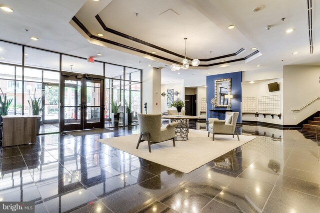 1001 N Randolph St Unit 109, Arlington, VA 22201 - community lobby featuring floor to ceiling windows, a towering ceiling, and recessed lighting