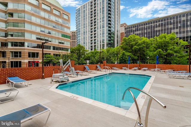 1001 N Randolph St Unit 109, Arlington, VA 22201 - community pool featuring a patio and fence
