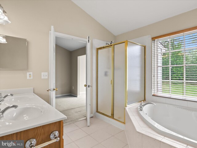 9757 Cheshire Ridge Cir, Manassas, VA 20110 - full bathroom with plenty of natural light, vaulted ceiling, a garden tub, a stall shower, and tile patterned flooring