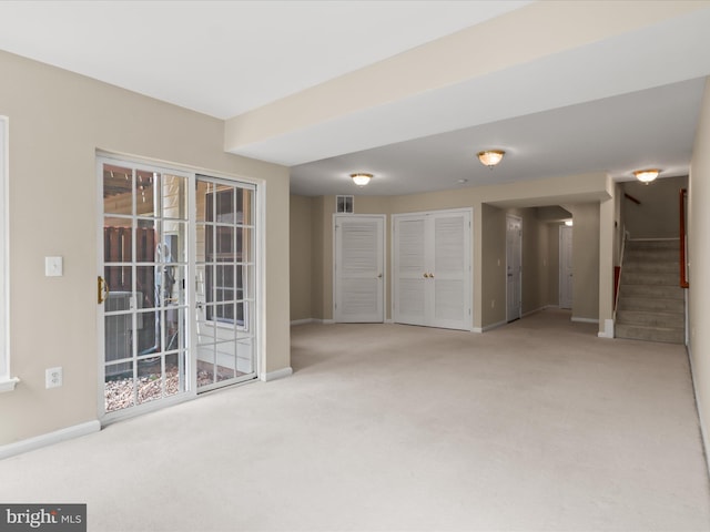 9757 Cheshire Ridge Cir, Manassas, VA 20110 - carpeted spare room with stairs and baseboards